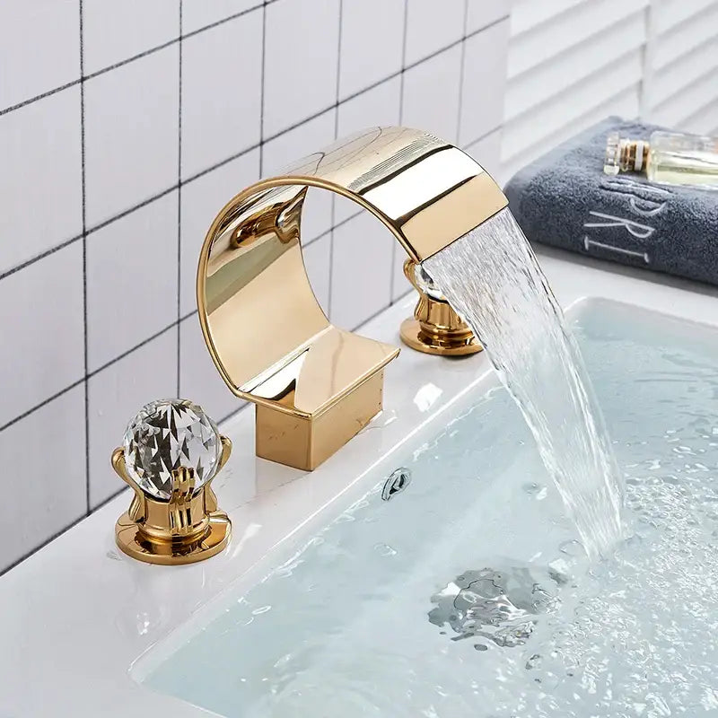 Gold waterfall double handle basin faucet with polished gold finish and crystal knob handles by decorbites gold waterfall