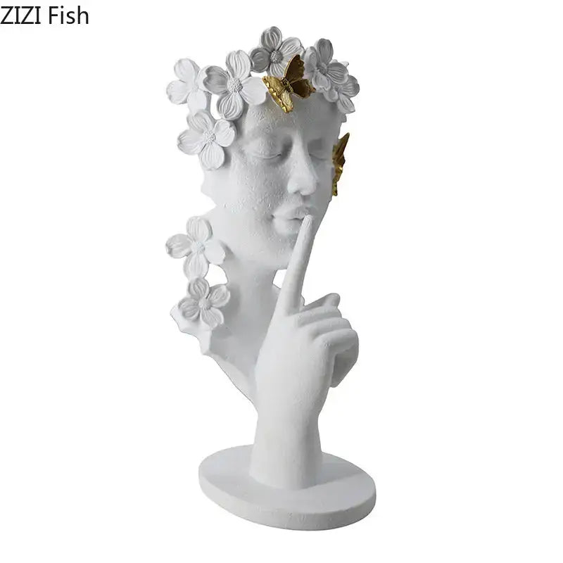 White resin sculpture of a woman with closed eyes adorned with white flowers and gold butterflies for living room decorbites gold silence garland figure