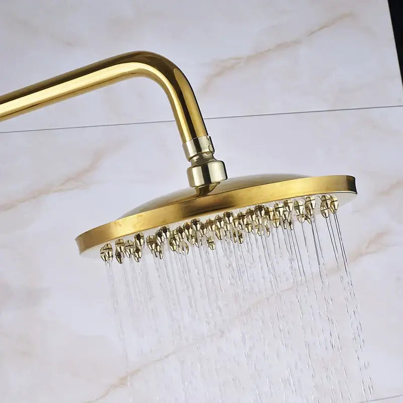 Gold-colored round showerhead with multiple jets and sleek metallic finish in decorbites dual handle wall mounted rainfall shower system