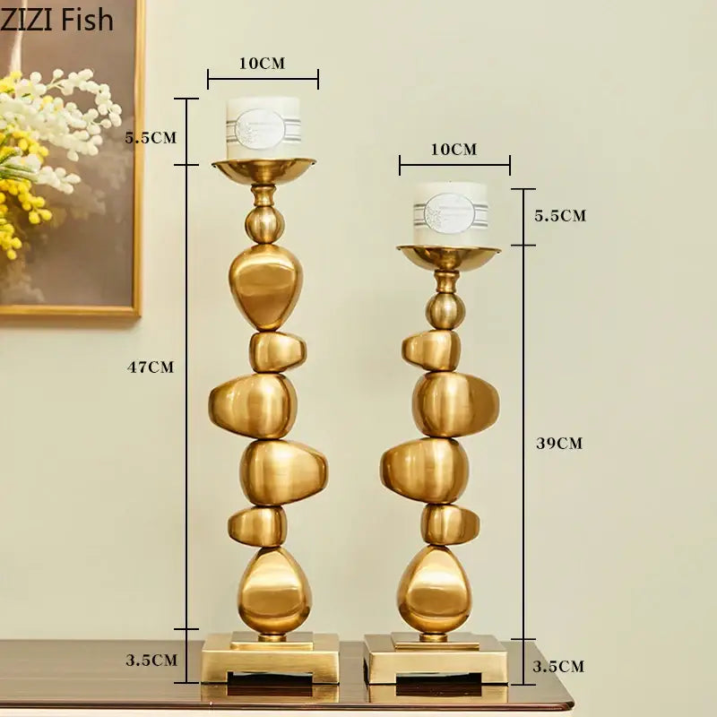 Golden alloy stone pile candle holder in gold color with stacked stone design for modern living room decorbites decor