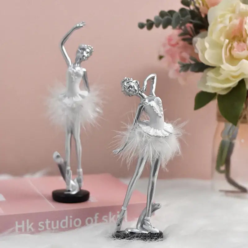 Silver ballet girl resin figurines with delicate white feather skirts and detailed poses for bedroom desktop decor