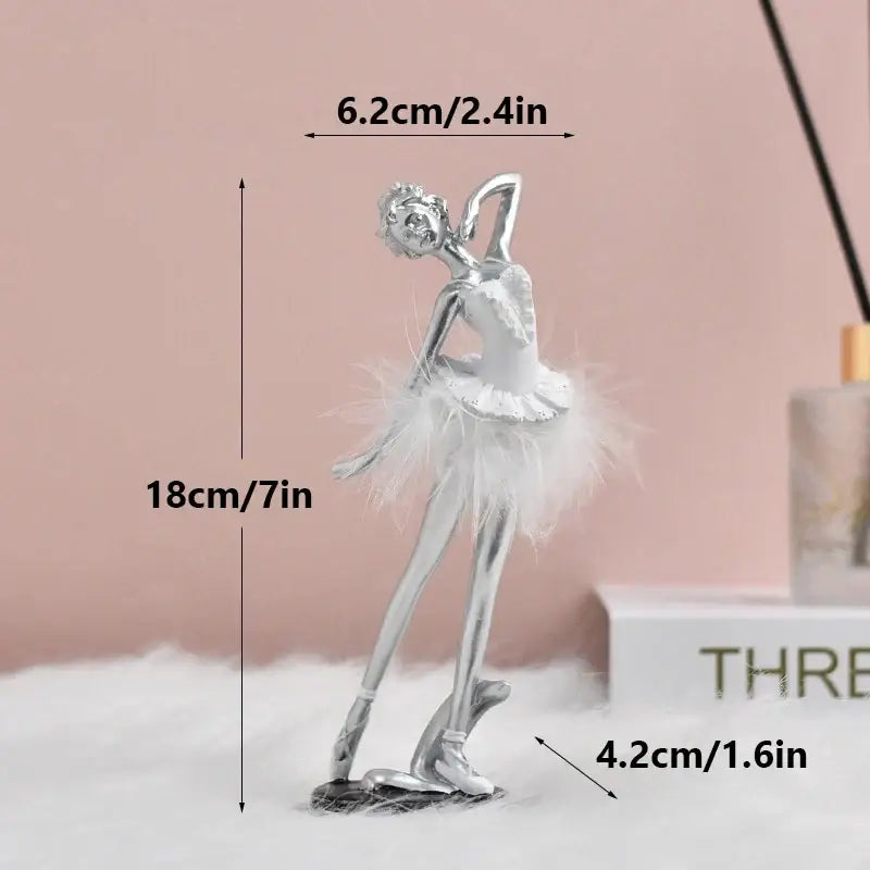 Silver ballet girl resin figurine with white feathered tutu and polished metallic finish for desktop decor