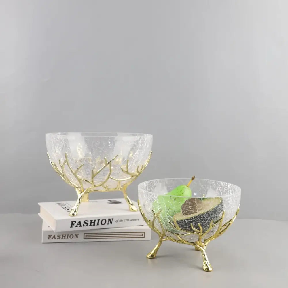 Clear glass fruit plate with crackled texture and gold-colored antler metal stand for dining room centerpiece