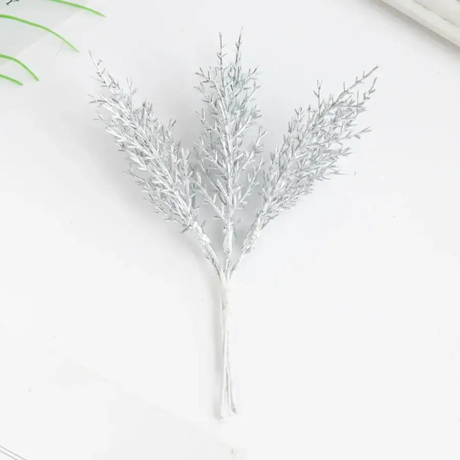 Silver metallic faux grass cluster with delicate stems and fine leaf tips in decorbites artificial autumn branches set