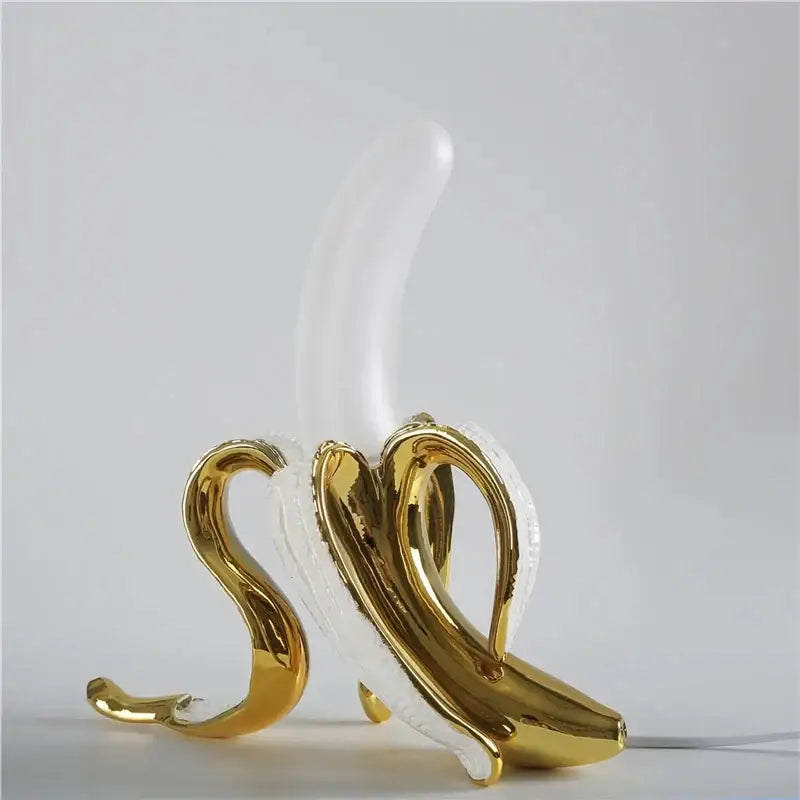 Golden and white banana-shaped decorbites glass lampshade night light with glossy reflective surface for bedroom decor