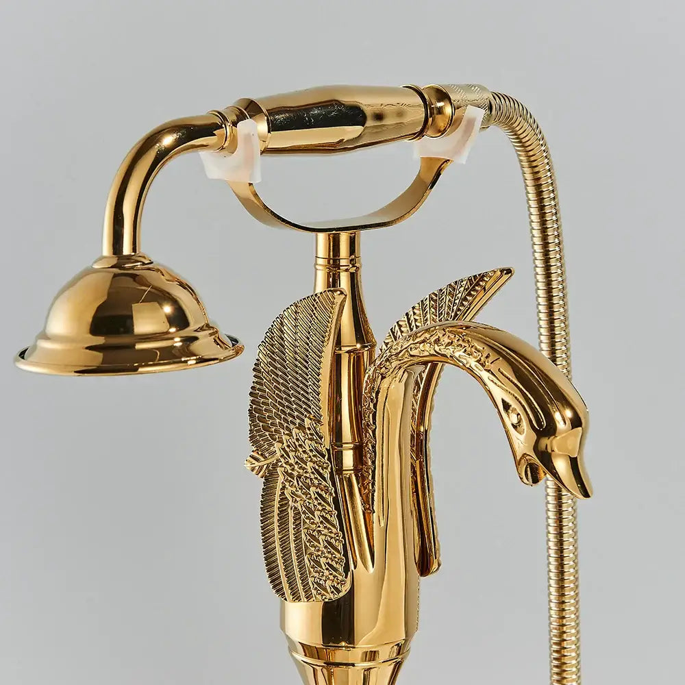 Golden bird freestanding bathtub faucet set in gold with swan shape ornate feathers and crystal handles decorbites golden bird