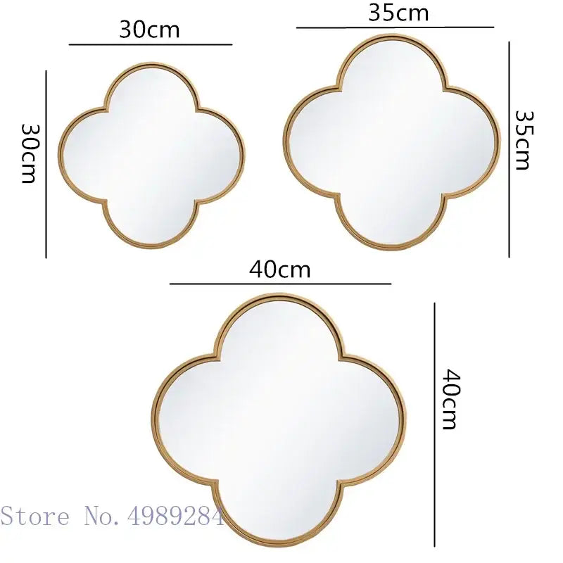 Three gold-toned geometric plum flower wall mirrors with golden border in 30cm to 40cm sizes for living room decor