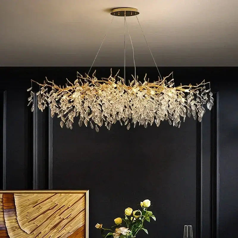 A decorbites golden branch ceiling chandelier with clear crystal leaves in gold for elegant living room decor