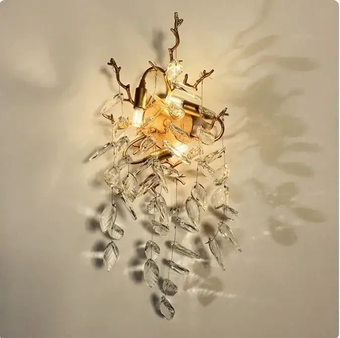 Gold-toned wall sconce with crystal leaf and branch accents for living room decorbites golden branch crystal chandelier