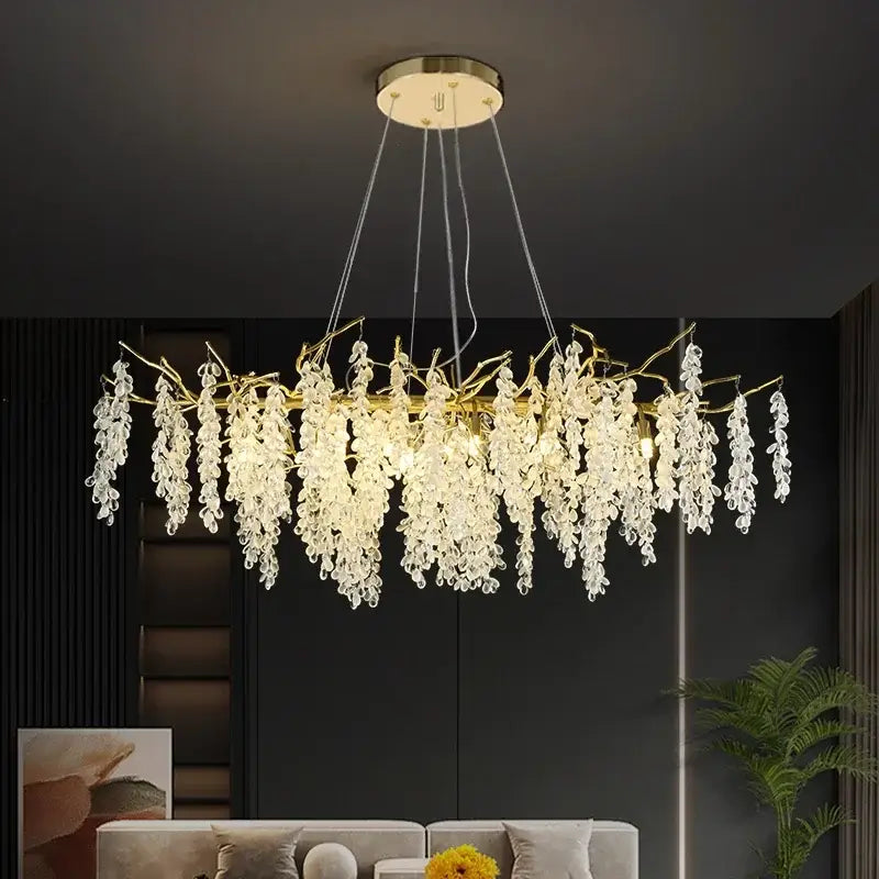 Modern golden branch crystal chandelier with cascading clear crystal droplets for elegant living room decorbites design