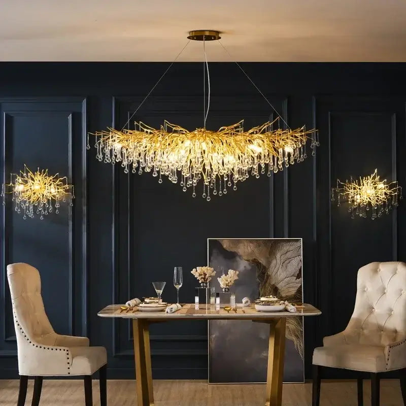 Golden crystal chandelier with intricate branch-like design and dangling crystal droplets for living room luxury lighting