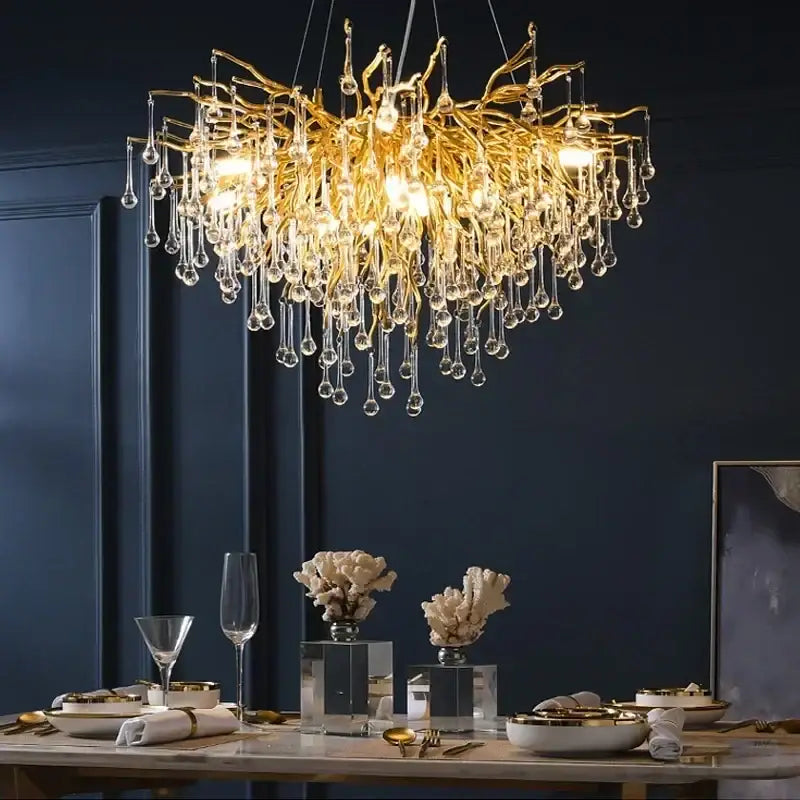 Golden crystal chandelier with branch-style design and cascading crystal droplets for living room luxury lighting
