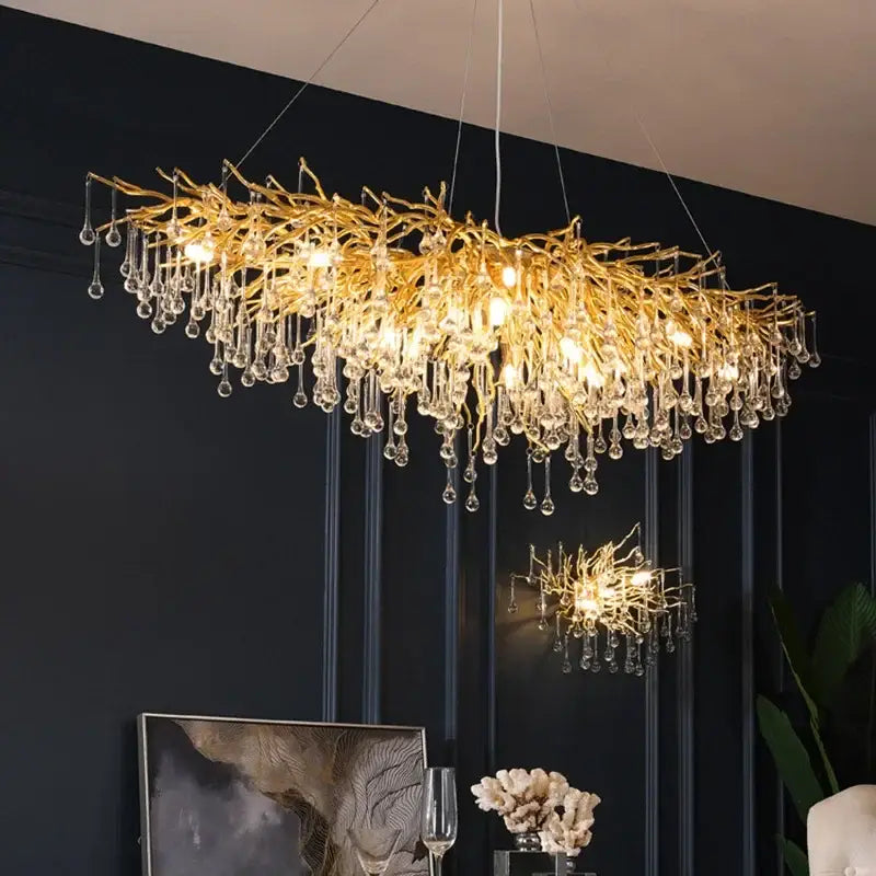 Golden branch crystal chandelier featuring gold branch design and dangling crystal droplets for living room luxury lighting