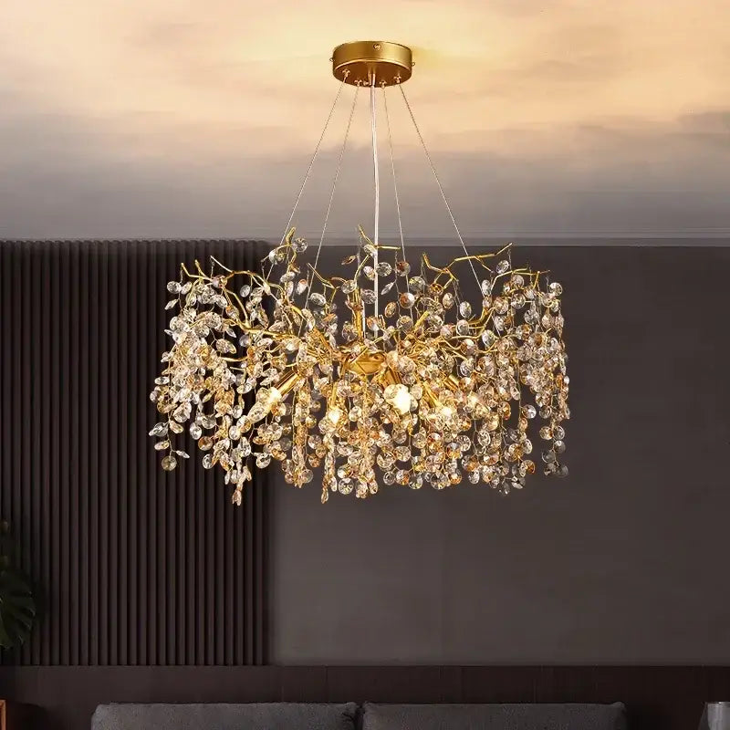 Golden branch crystal led chandelier with intricate metalwork and clear crystal droplets luxury dining room decorbites crystal led