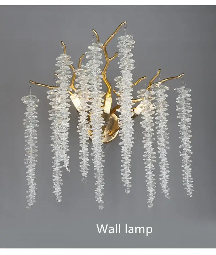 Elegant gold-toned dining room pendant light with crystal tassel strands like delicate branches decorbites crystal tassel