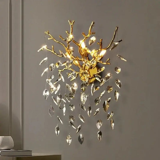 Golden branch crystal wall lamp with dangling crystal leaves in gold for elegant living room decorbites crystal wall sconce