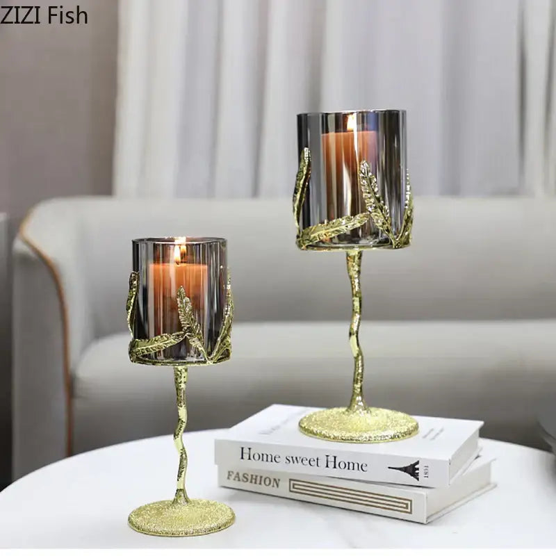 Gold-toned glass candle holders with gold leaf accents twisted stems and glittery bases decorbites golden branches candle decor