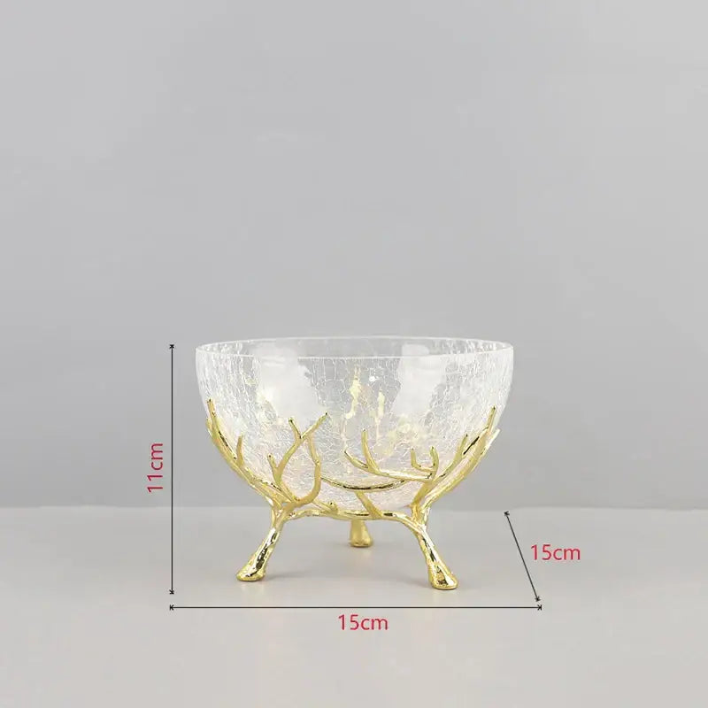 A clear crackled glass bowl set with golden branches metal antler-like stand for elegant kitchen decorbites decorbites golden branches