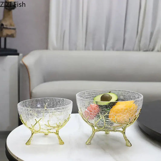 Clear glass bowl set with crackled texture and gold-colored metal tree branch stand for decorbites golden branches decor