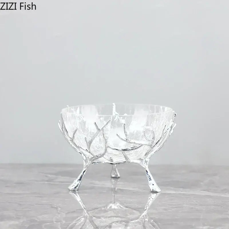 Clear glass bowl set with intricate silver golden branches legs and frosted textured interior decorbites golden branches decor