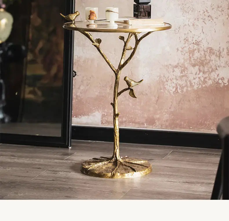 Golden brass bird tree side table with intricate branches and two small bird figurines for living room decorbites brass bird decor