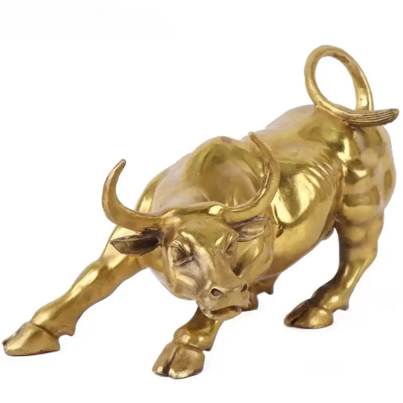 Decorbites golden bull figurine sculpture in golden brass with curved horns and curled tail for office decor
