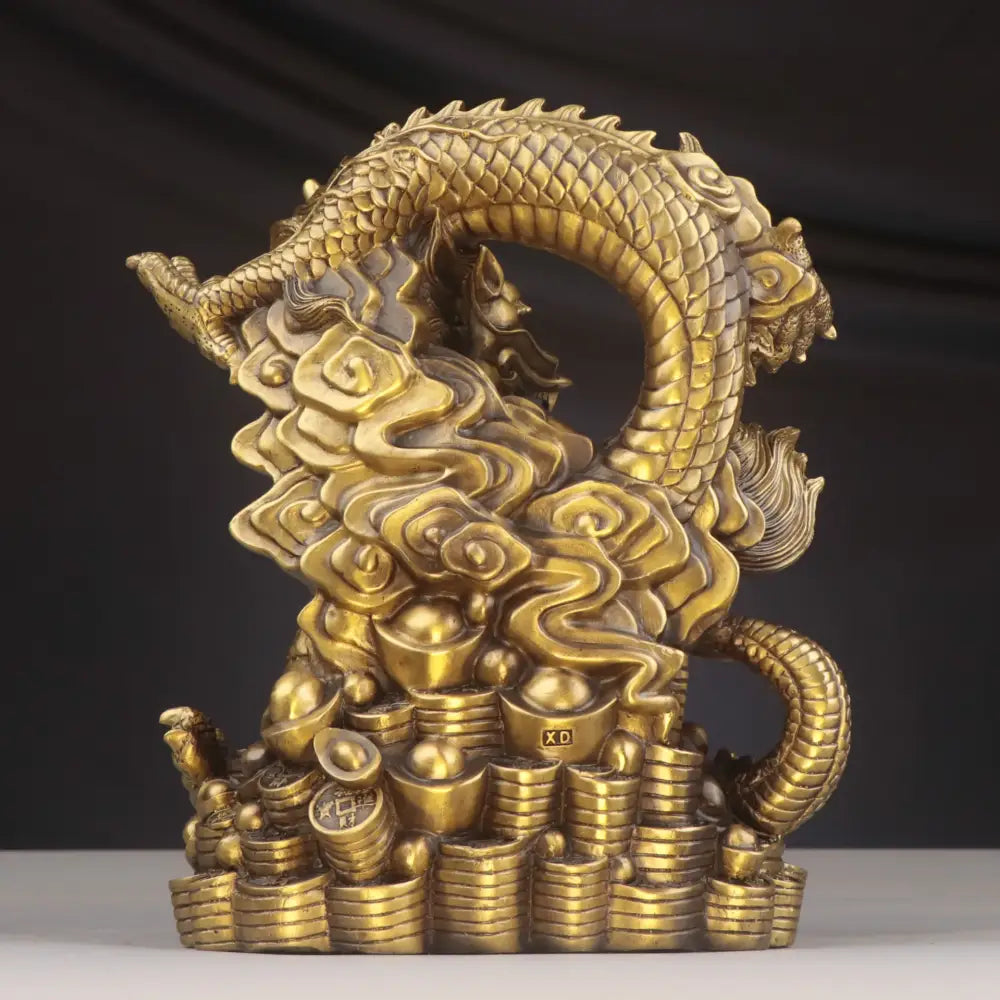 Golden brass dragon zodiac copper bowl ornament featuring a coiled dragon over stylized clouds and coin ingots