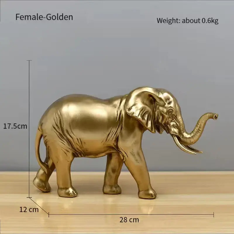 Golden brass elephant resin sculpture with detailed sculpted features and polished metallic finish for living room decorbites elephant resin decor
