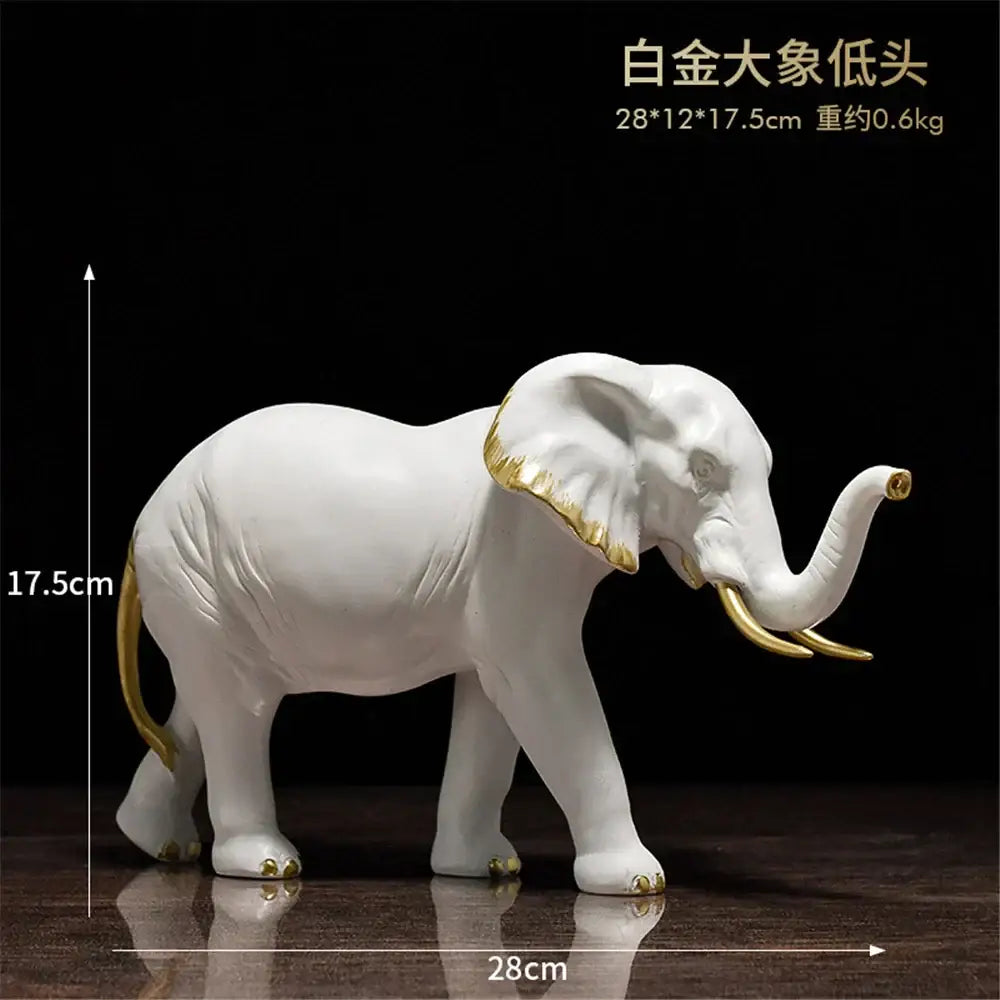 White ceramic decorbites elephant resin sculpture with gold accents on ears tusks and feet for living room decor