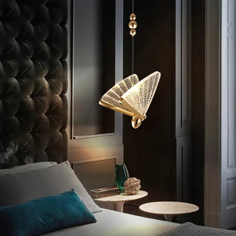 Gold-toned decorbites butterfly led pendant light with fan-shaped mesh design and three spheres for bedroom decor