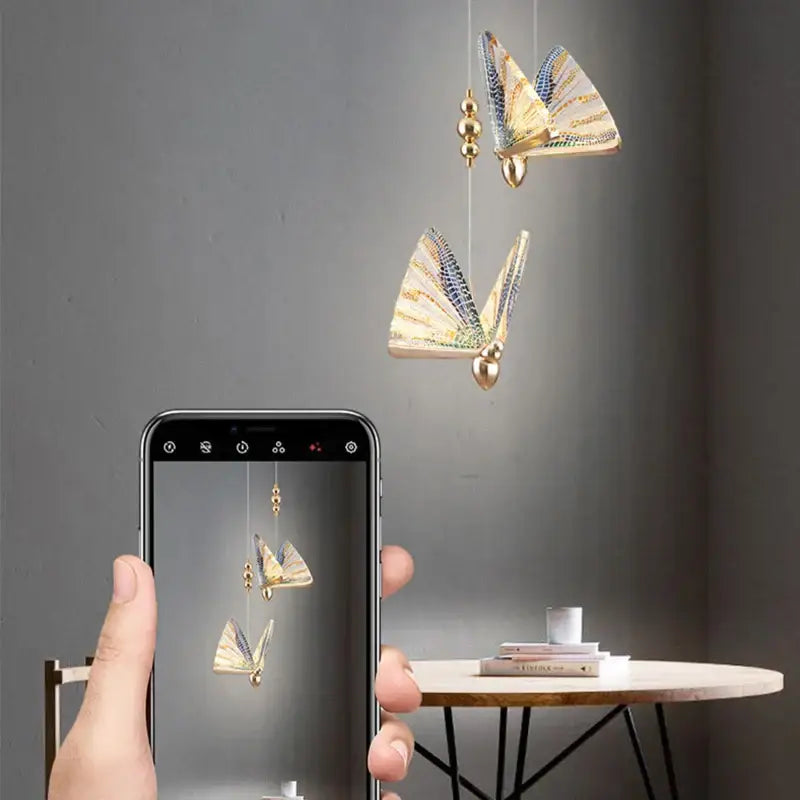 Gold and blue butterfly led pendant light with intricate wing patterns for bedroom and dining room decorbites butterfly led
