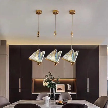 Three elegant gold butterfly led pendant lights with iridescent glass shades for bedroom and dining room decorbites butterfly led