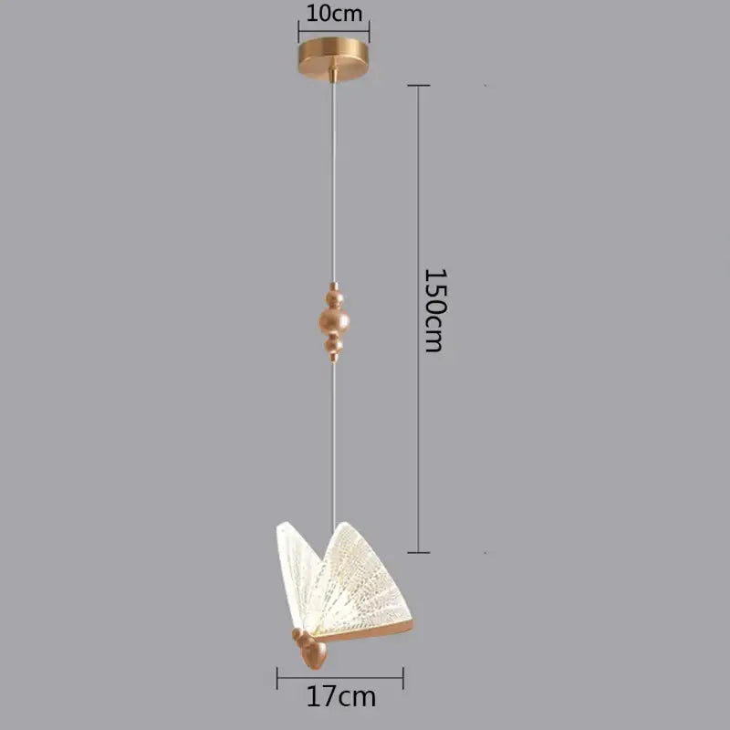 Gold-toned butterfly led pendant light with translucent patterned wings and slender cord suspension for kitchen use