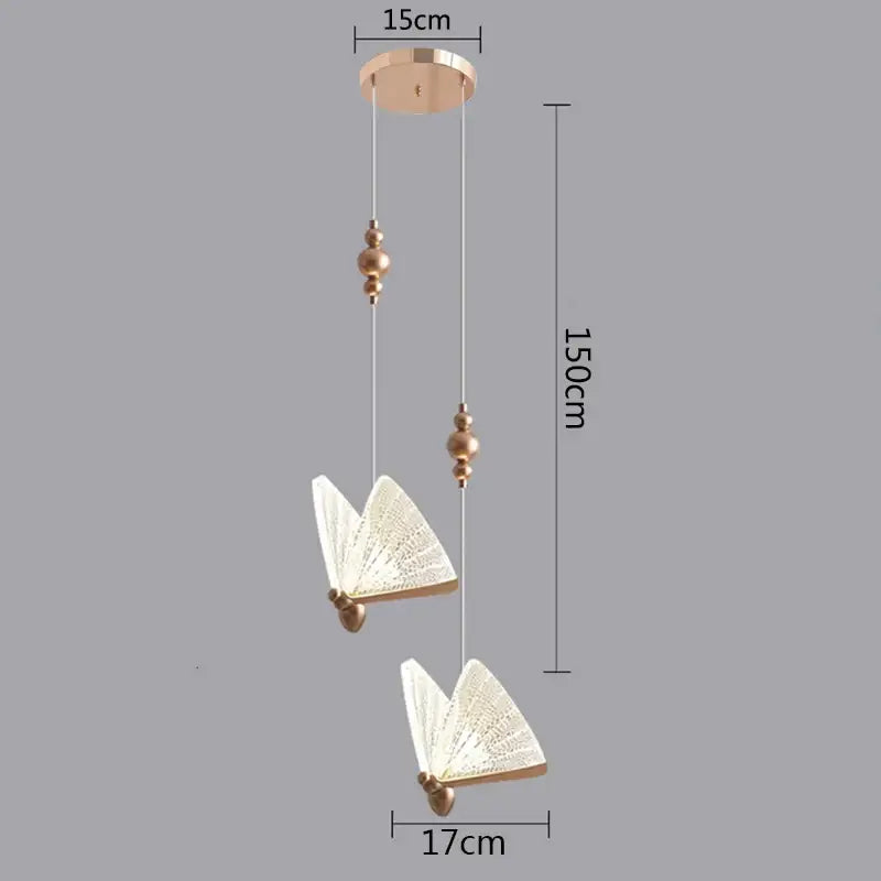 Gold-toned butterfly led pendant light with intricate white lace-like wings and 150cm hanging length for kitchen use