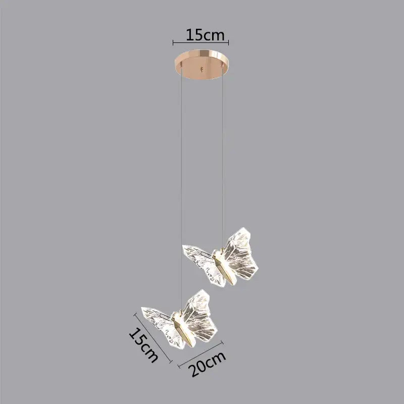 Golden butterfly led pendant light with rose gold mount and two clear crystal butterflies for kitchen chandelier