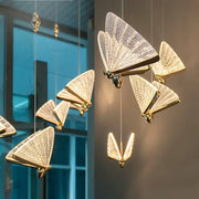 Golden butterfly led pendant light with intricate mesh wings and metallic bodies for kitchen and dining room pendant chandelier