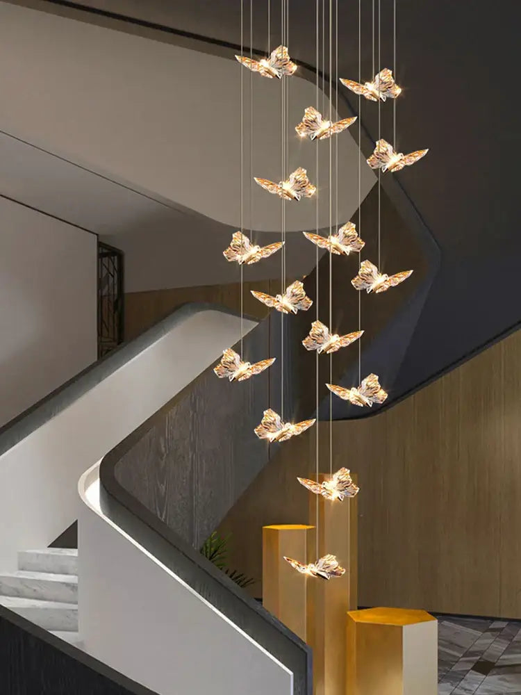 Golden butterfly pendant light with butterfly chandelier staircase design suspended in living room ceiling