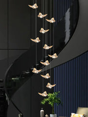 Golden butterfly pendant light chandelier suspended from the ceiling for staircase or living room use