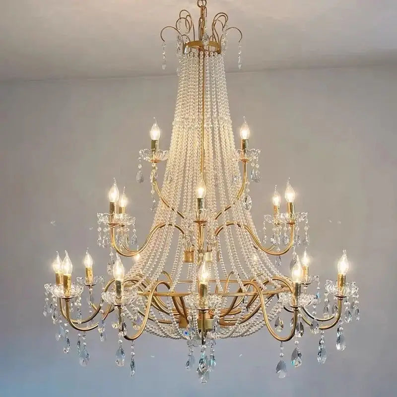 Golden cascading crystal led chandelier pendant light featuring gold-toned decorbites crystal led strands for villa stairs decor
