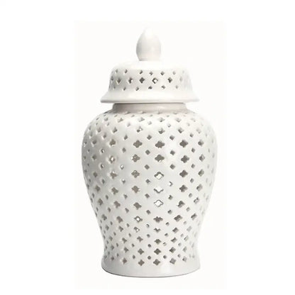 White ceramic ginger jar with matching lid and intricate diamond cutouts by decorbites golden ceramic for home decor