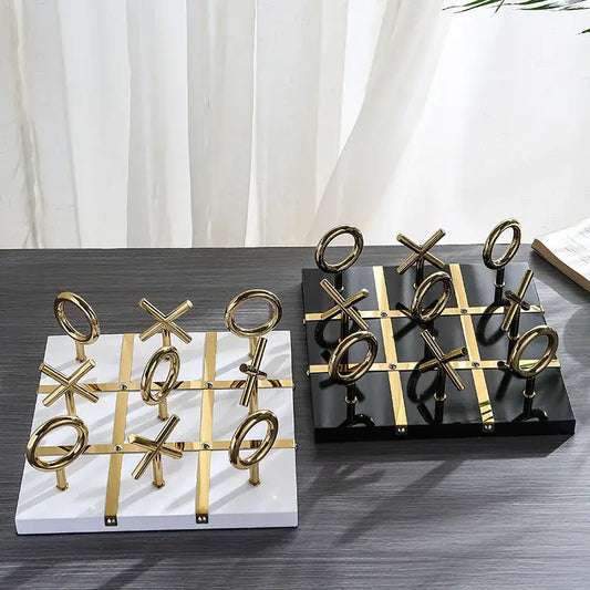 Decorbites golden chessboard metal handicraft tic-tac-toe set with gold pieces on white and black marble bases for living room decor