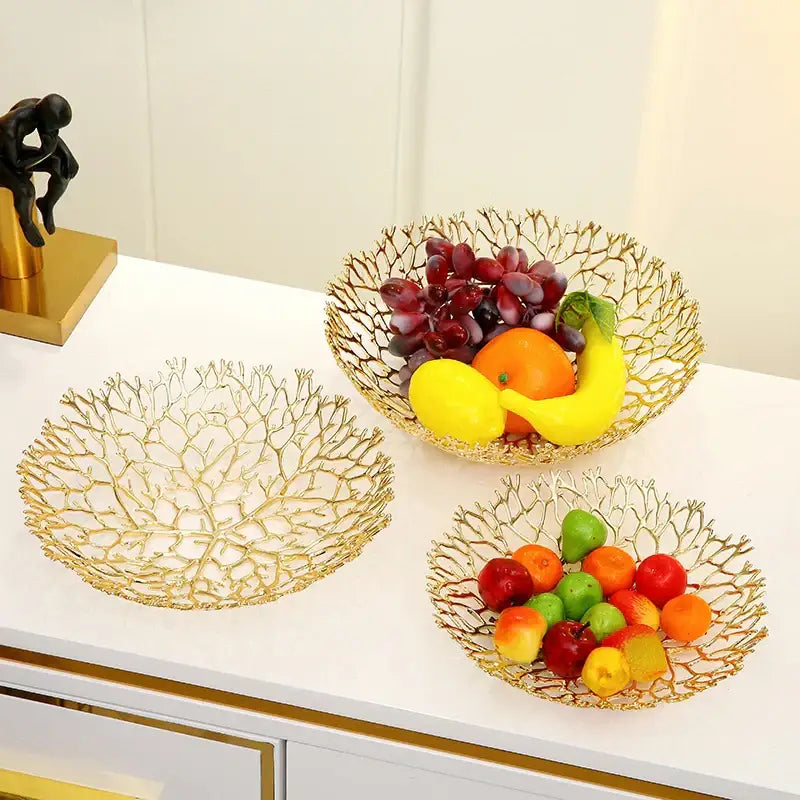 Golden intricately woven metal tray with coral shapes and delicate mesh design for dining room fruit bowl decorbites coral shapes