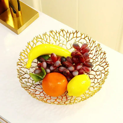 Golden metal tray fruit bowl with intricately woven coral shapes design by decorbites for dining room decor