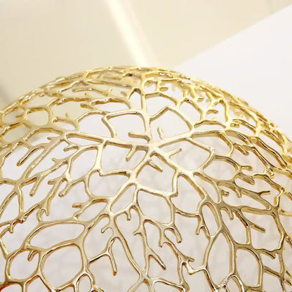 Golden coral shapes metal tray with an intricately woven lace-like dome for dining room decorbites coral shapes