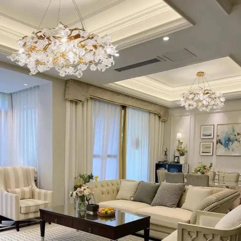 Golden crystal branch ceiling chandelier with delicate flower-like glass pieces and gold-toned accents dining room light fixture