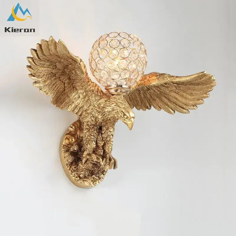 Golden crystal eagle wall lamp with outstretched wings and a crystal globe light fixture for living room decorbites crystal eagle