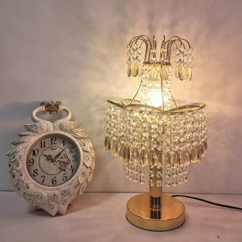 Golden crystal table lamp with teardrop accents and gold-toned metal base for bedroom decorbites crystal table lighting