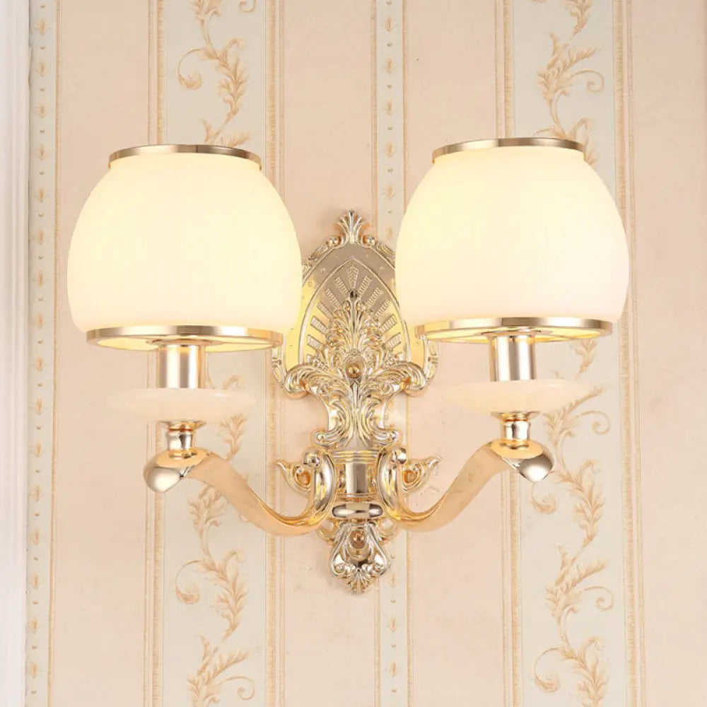 DecorBites™ DecorBites™ Golden Curved Arm Wall Light with Geometric Glass Shade - Modern Lighting Idea