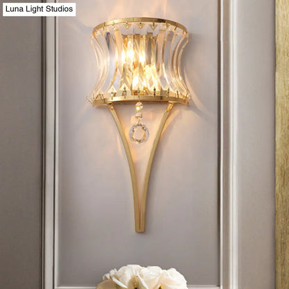 DecorBites™ Golden Curved Metal Wall Sconce with Clear Crystal Prism