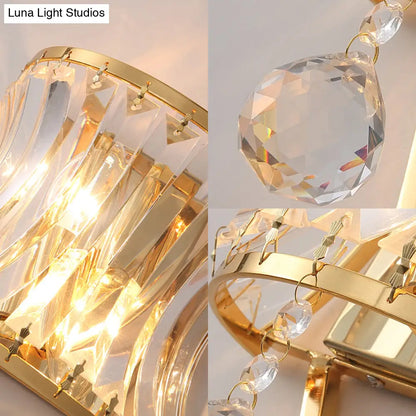 DecorBites™ Golden Curved Metal Wall Sconce with Clear Crystal Prism